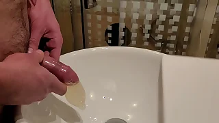 Pissing inner a set condom